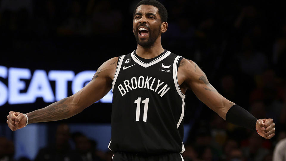 Kyrie Irving celebrates while playing for the Brooklyn Nets.