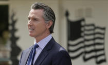 FILE - In this Friday, May 22, 2020, file photo, California Gov. Gavin Newsom speaks during a news conference at the Veterans Home of California in Yountville, Calif. A federal appeals court has denied a Southern California church's request to overturn the state's coronavirus restrictions barring worship services indoors during the coronavirus pandemic. The Sacramento Bee says Friday, Jan. 22, 2021, ruling by the 9th U.S. Circuit Court of Appeals leaves the door open for addressing Gov. Gavin Newsom administration's limits on church attendance if a California county is in a less-restrictive COVID-19 tier. (AP Photo/Eric Risberg, Pool, File)