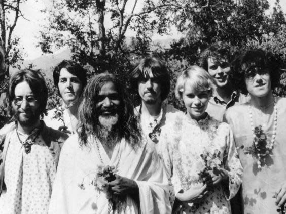 John Lennon, Paul McCartney, the Maharishi Mahesh Yogi, George Harrison, actor Mia Farrow and musician Donovan (far right) in Rishikesh, India, in 1968 (Keystone/Shutterstock)