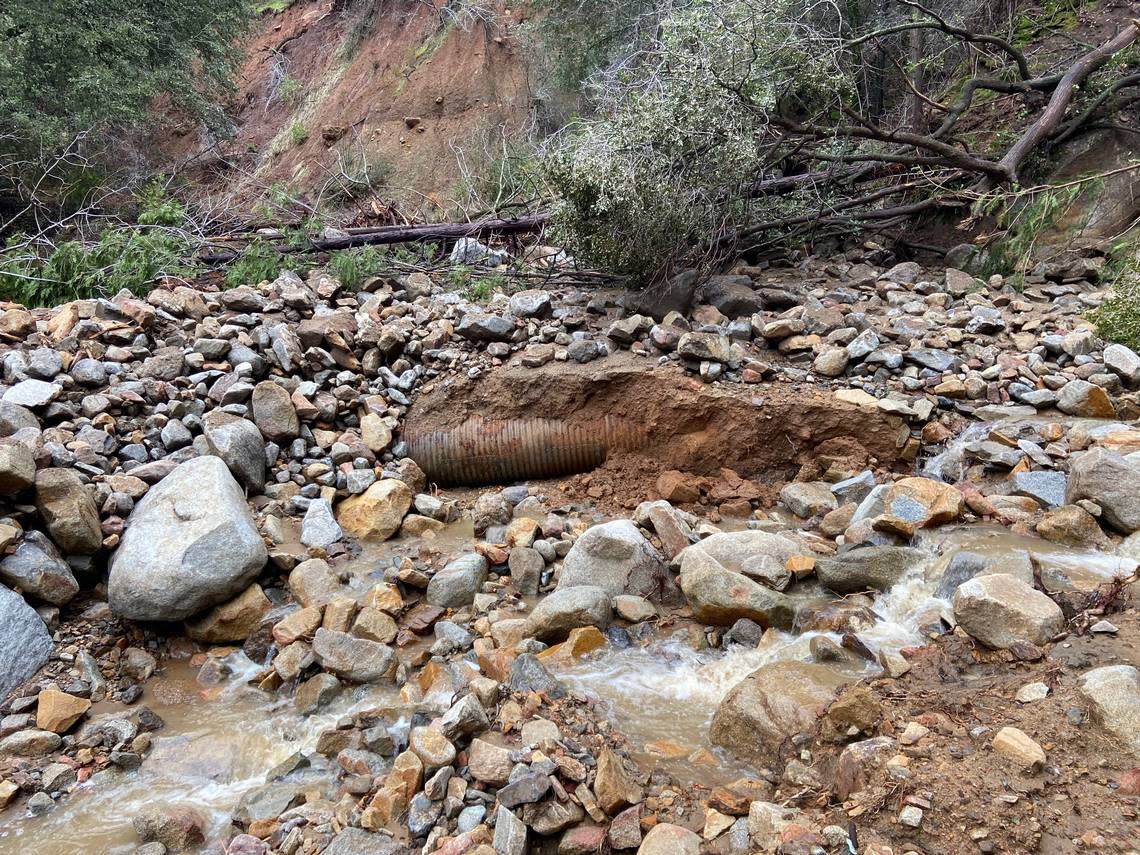 The road to Sequoia National Park’s South Fork Campground is littered with flood damage in January 2023, including this culvert exposed by a rock and mud slide.