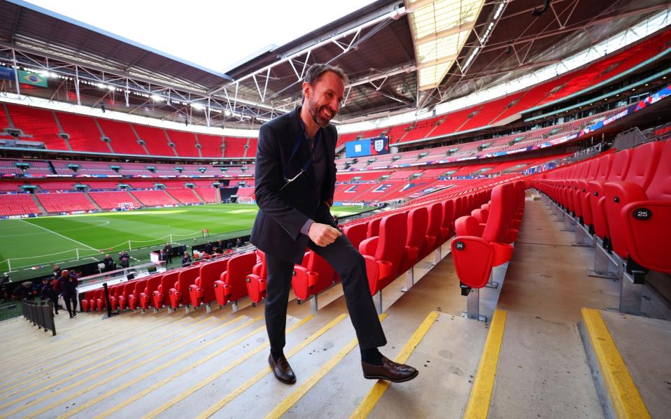 England manager Gareth Southgate walking up the steps at Wembley