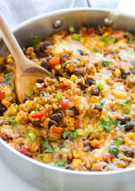 One-skillet Mexican rice casserole is an easy option for dinner with almost zero clean up. It’s gluten-free and can easily be made vegan too!<p><strong>Get the recipe: <a href="https://www.makingthymeforhealth.com/one-skillet-mexican-rice-casserole/" rel="sponsored" target="_blank" data-ylk="slk:One-Skillet Mexican Rice Casserole;elm:context_link;itc:0;sec:content-canvas" class="link ">One-Skillet Mexican Rice Casserole</a></strong></p>