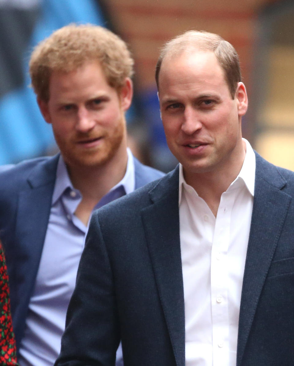 Prince Harry and Prince William attend a Christmas party for volunteers at The Mix youth service on Dec. 19, 2016, in London. (Photo: Danny Martindale via Getty Images)