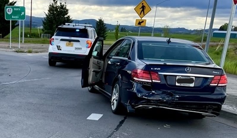 Lisa L. Sullivan of Cornelius was arrested after allegedly causing two crashes, including this one with a Mercedes, before going over an embankment along Highway 47 in Forest Grove, April 28, 2024 (Washington County Sheriff's Office)