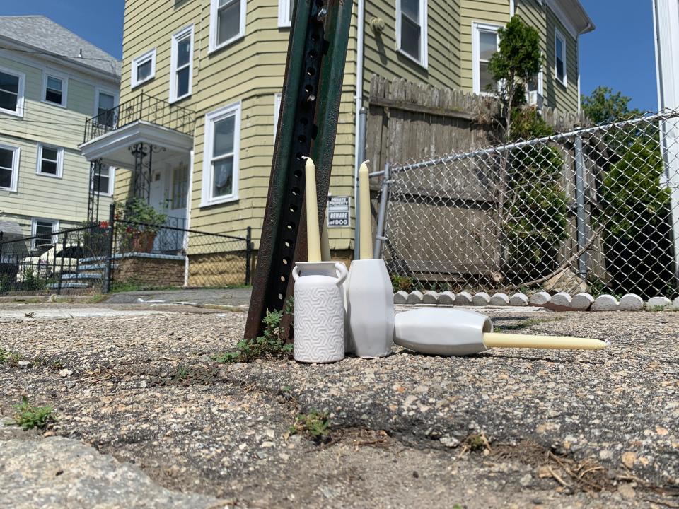 A memorial has been set up in front of a house on Wallace Street in Providence following the fatal shooting of a 15-year-old boy. Police had no suspects as of Sunday afternoon.