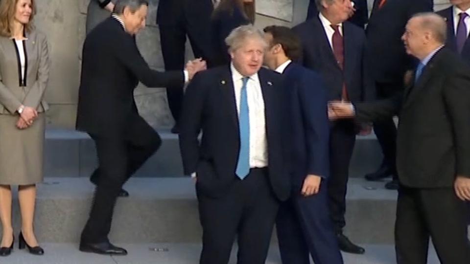 Boris Johnson stood alone while other EU leaders greeted each other (Screengrab)