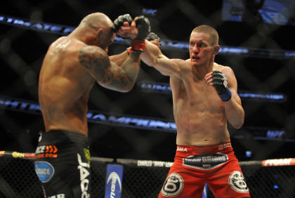 Seth Baczynski (right) has nine UFC fights. (USA Today)