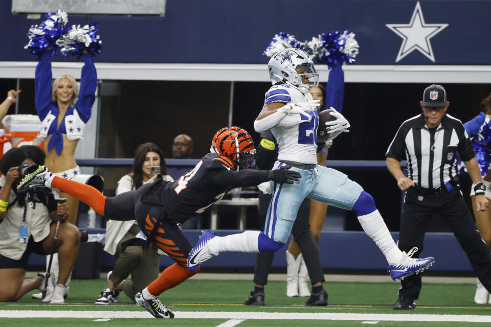 Dallas Cowboys running back Tony Pollard (20) gets close to the end zone as Cincinnati Bengals safety Vonn Bell (24) makes the stop during the first half of an NFL football game Sunday, Sept. 18, 2022, in Arlington, Tx. (AP Photo/Michael Ainsworth)