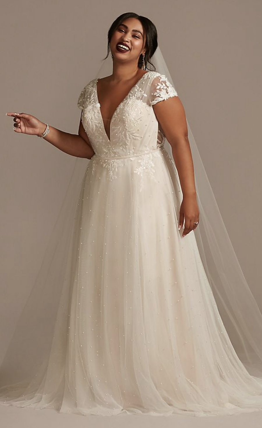 Oleg Cassini Cap Sleeve Low Back Wedding Gown. 