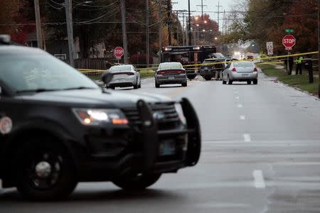 Police in Urbandale, Iowa conduct an investigation after two police officers were shot and killed in separate attacks described as "ambush-style" in Des Moines, Iowa, U.S. November 2, 2016. REUTERS/Brian Frank