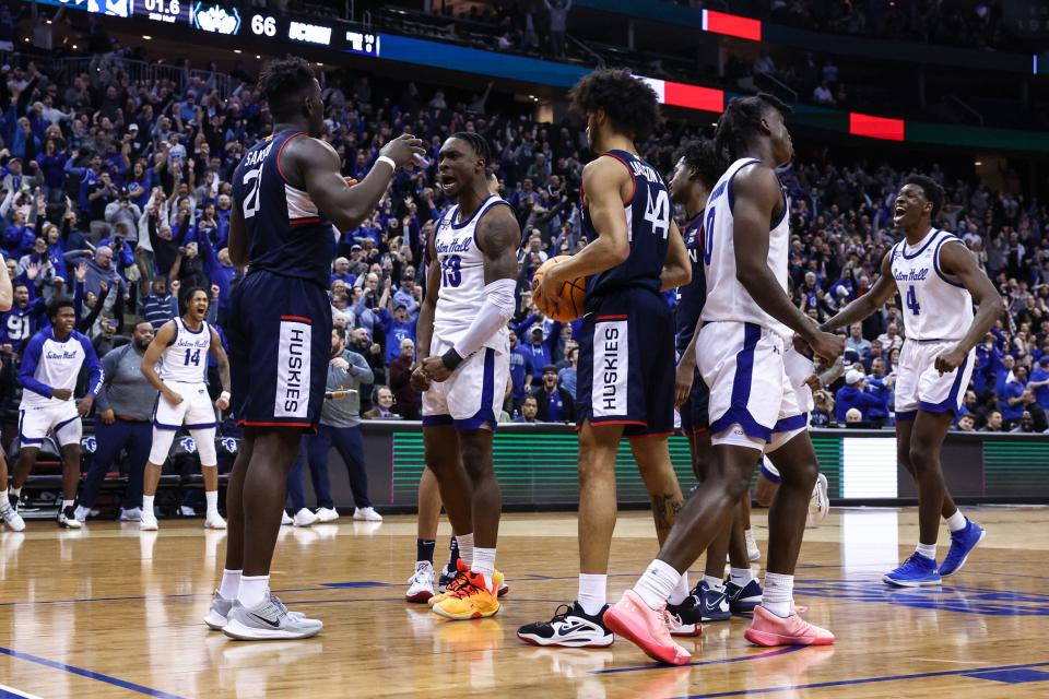 Seton Hall Pirates forward KC Ndefo (13) reacts after scoring the game-winning basket after being fouled by Connecticut Huskies forward Adama Sanogo (21) during the second half in front of guard Kadary Richmond (0) and guard Andre Jackson Jr. (44) at Prudential Center.