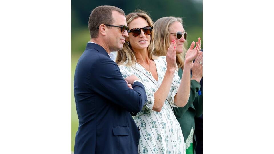 Harriet Sperling clapping with peter phillips