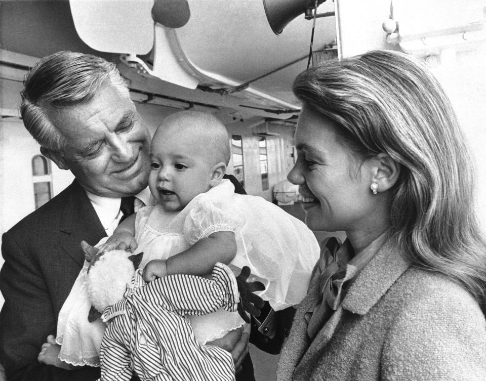 Actor Cary Grant poses with his wife, Dyan, and their baby, Jennifer on the deck of the Steamship Canberra in Los Angeles, Oct. 4, 1966 as they return from a lengthy trip to Europe. The Grants have been visiting his mother in England. (AP Photo/Ellis Bosworth)