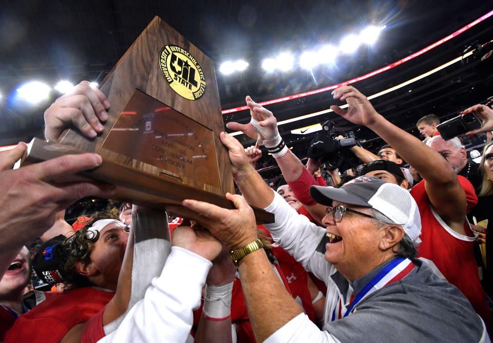 At last, Albany football coach Denney Faith could hold high a state championship trophy.