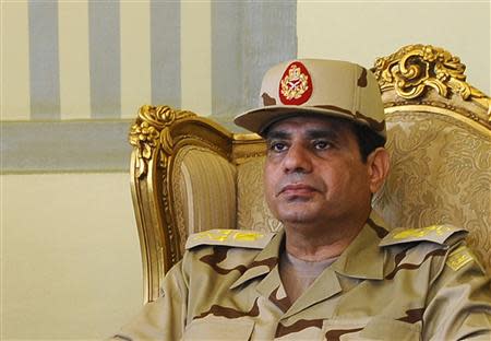 Egypt's Defense Minister Abdel Fattah al-Sisi is seen during a news conference in Cairo on the release of seven members of the Egyptian security forces kidnapped by Islamist militants in Sinai, in this May 22, 2013 file photo. REUTERS/Stringer