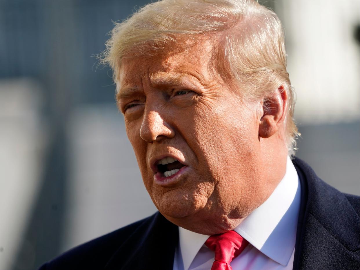 <p>President Donald Trump speaks to the media before boarding Marine One on the South Lawn of the White House, on Tuesday 12 January 2021, in Washington.</p> ((Associated Press))