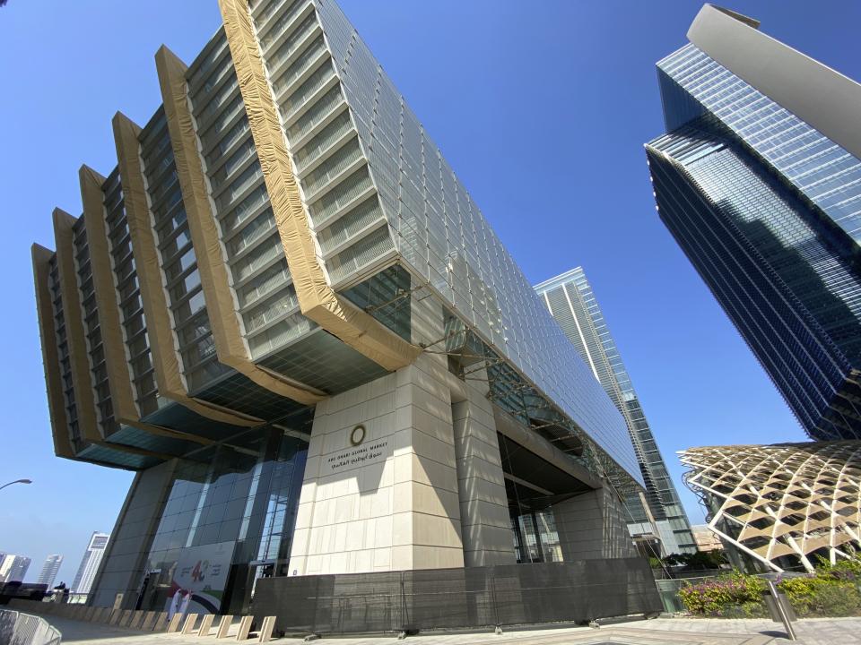 In this Tuesday, Dec. 31, 2019 photo, the Abu Dhabi Global Market is seen in Abu Dhabi, United Arab Emirates. Corporate filings involving the Emirati voice and video calling app ToTok disappeared after reports alleging it was a spy tool of the UAE government. After an AP journalist inquired about the firms, their information reappeared in the database. Market spokeswoman Joan Lew blamed a "data migration" problem for their disappearance. (AP Photo/Jon Gambrell)