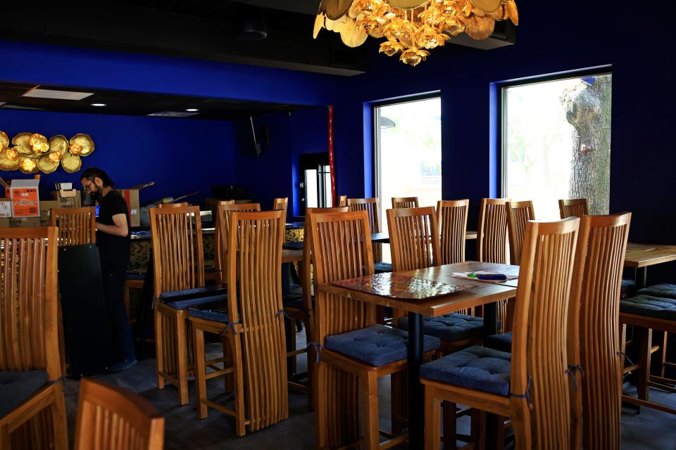 A secondary seating area near a bar is shown Tuesday, April 5, 2022 at Blue Orchid Thai Cuisine in Riverside. The restaurant boasts ample outdoor seating, a bar, private and main dining areas.