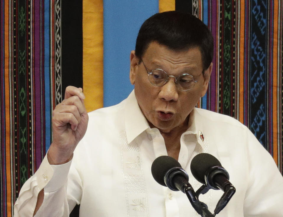 Philippine President Rodrigo Duterte talks during his 4th State of the Nation Address at the House of Representatives in Quezon city, metropolitan Manila, Philippines Monday July 22, 2019. (AP Photo/Aaron Favila)