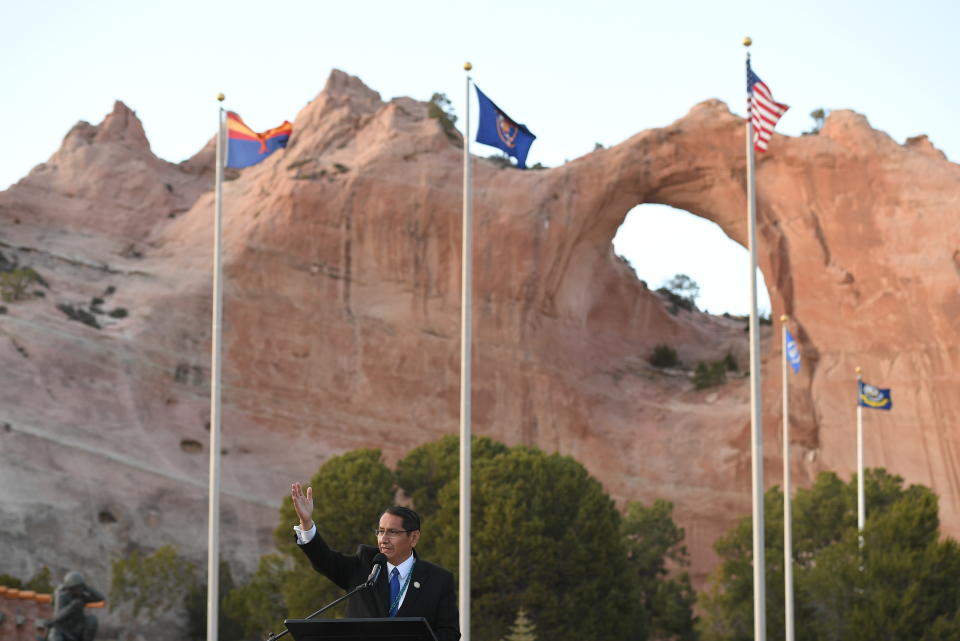 Navajo Nation President Jonathan Nez speaks during a live radio address with first lady Jill Biden in attendance, in Window Rock, Ariz., on Thursday, April 22, 2021. Nez questions the fairness in awarding more money to tribes that don't have at least a one-fourth blood quantum. "Here on Navajo, we verify blood quantum, and that's a requirement," he says. (Mandel Ngan/Pool via AP, File)