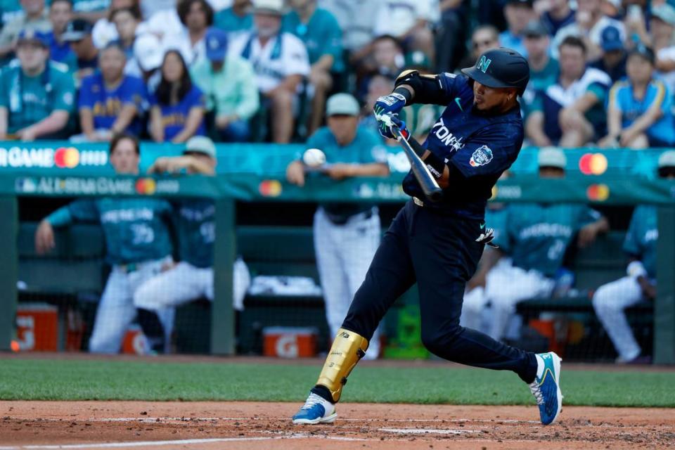 National League second baseman Luis Arraez of the Miami Marlins (3) hits an RBI single against the American League during the fourth inning of the 2023 MLB All Star Game at T-Mobile Park.