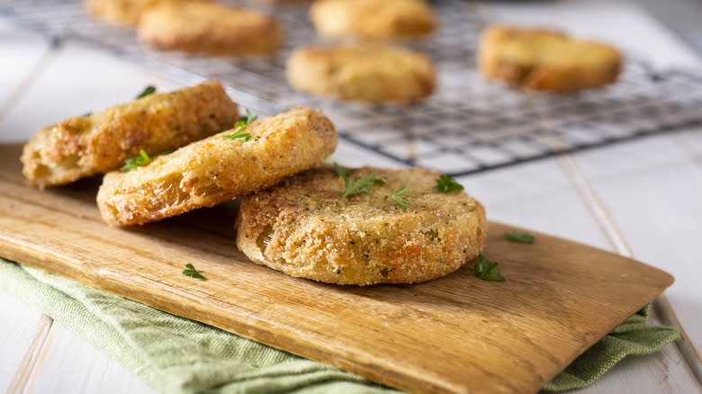 fried green tomatoes on wooden board