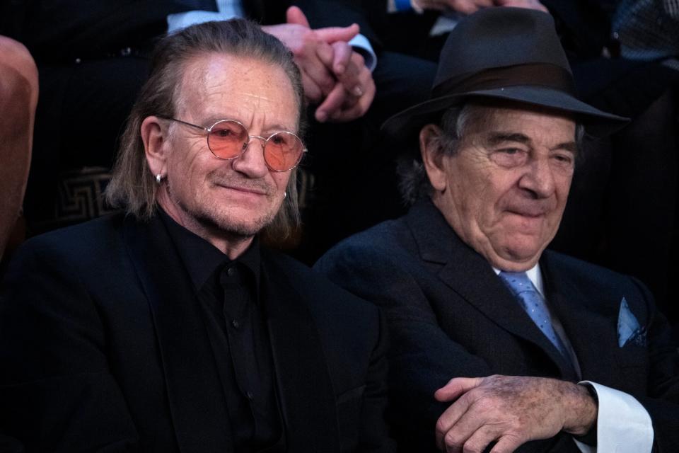 Bono, left, and Paul Pelosi, the husband of Rep. Nancy Pelosi, D-Calif., listen to President Joe Bidens State of the Union address in the House Chamber of the U.S. Capitol on Tuesday, February 7, 2023.