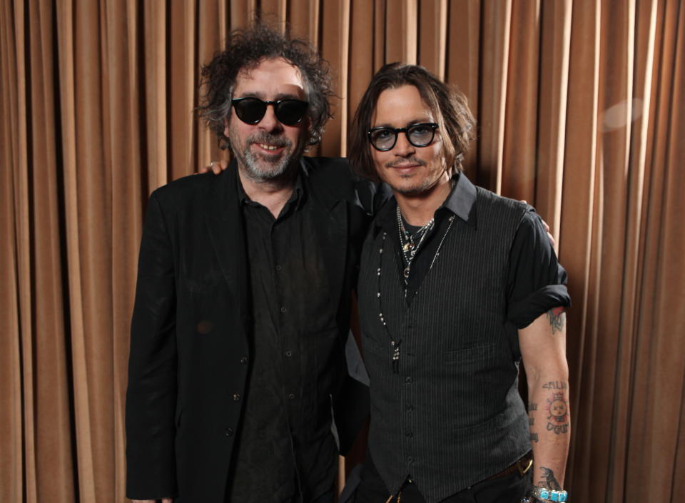 LAS VEGAS, NV - APRIL 24:  (EXCLUSIVE COVERAGE) Director Tim Burton and Johnny Depp at Warner Bros. Pictures Present The Big Pictures 2012 At CinemaCon at Caesars Palace on April 24, 2012 in Las Vegas, Nevada.  (Photo by Eric Charbonneau/WireImage)