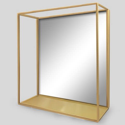 Get it at <a href="https://www.target.com/p/decorative-wall-mirror-and-shelf-brass-project-62-153/-/A-52446727#lnk=newtab" target="_blank">Target, $40</a>.