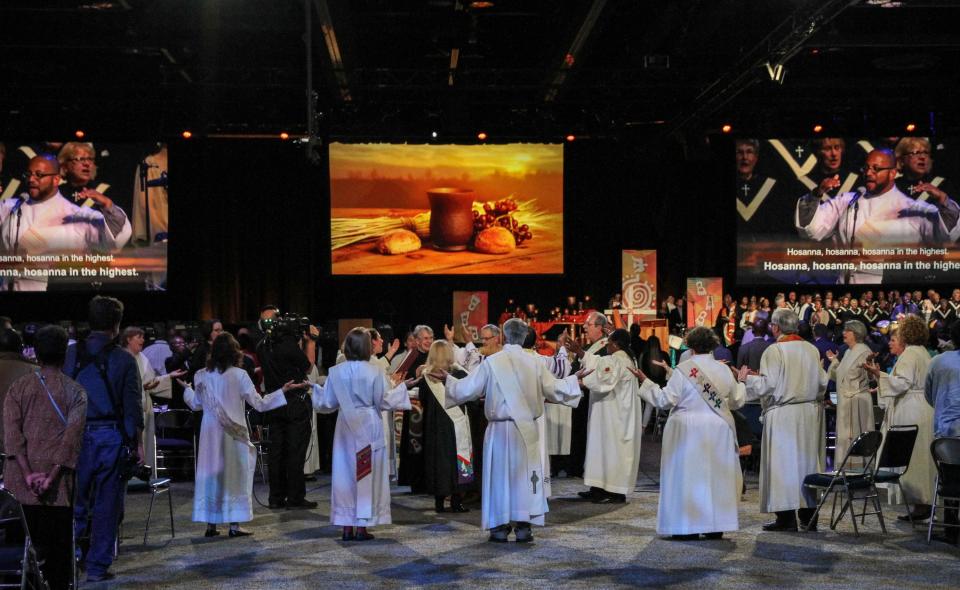 United Methodist bishops and deacons lead worship at the UMC General Conference in 2016 in Portland, Oregon, which was the last time the denomination's top legislative assembly convened for a regular session. The general conference is set to gather in Charlotte starting April 22, 2024.
