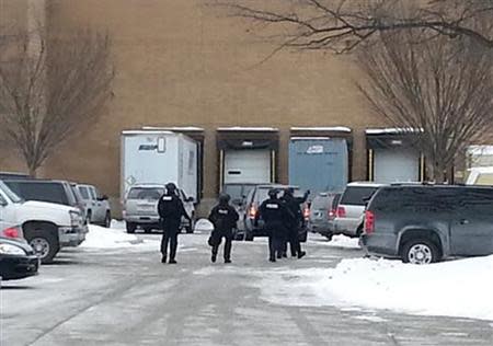 Officers are seen at mall in Columbia, Maryland, January 25, 2014. REUTERS/DCMediagroup/Robert Brune