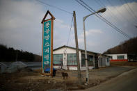 An abandoned ski rental shop stands in front of the Alps Ski Resort located near the demilitarised zone separating the two Koreas in Goseong, South Korea, January 17, 2018. REUTERS/Kim Hong-Ji