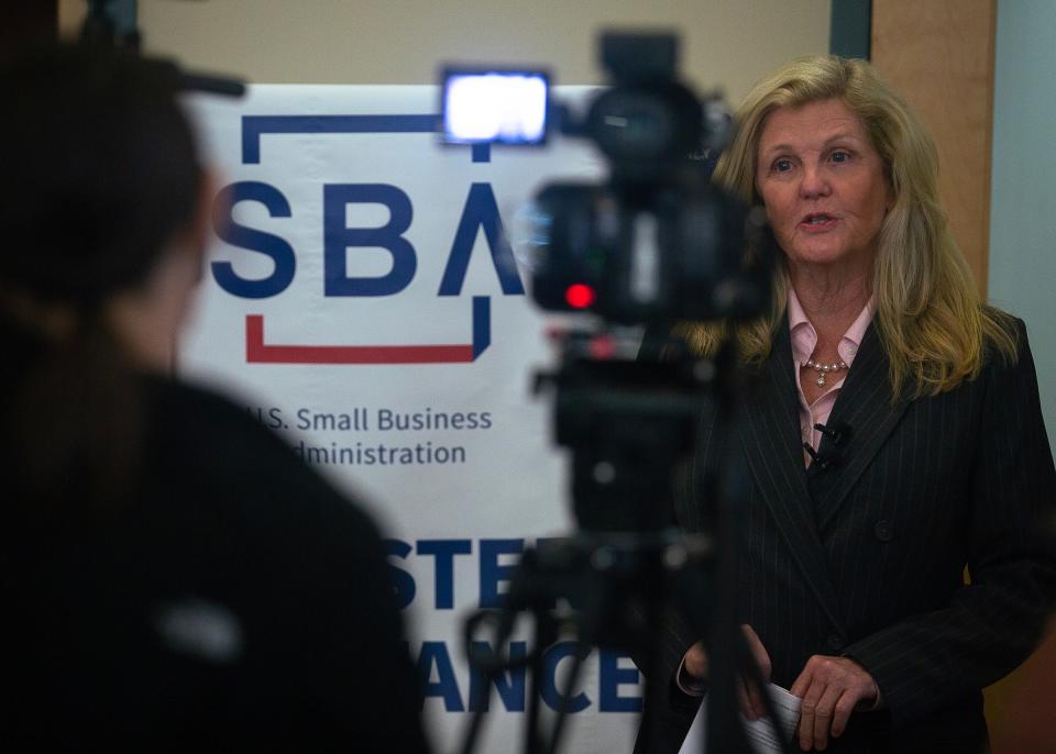 Clair Pease, Bay County District 5 commissioner, addresses media at the Bay County Public Library in Panama City on April 2 about obtaining low-interest disaster loans from the U.S. Small Business Administration. The program is in response to the Jan. 8-9 storms, straight-line winds, and tornadoes that affected the region.