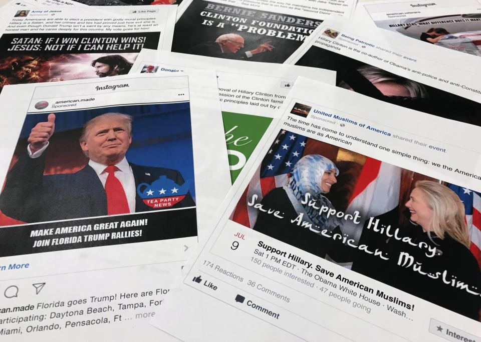 FILE - This Nov. 1, 2017 file photo shows printouts of some of the Facebook and Instagram ads linked to a Russian effort to disrupt the American political process and stir up tensions around divisive social issues, released by members of the U.S. House Intelligence committee, photographed in Washington. (AP Photo/Jon Elswick, File)
