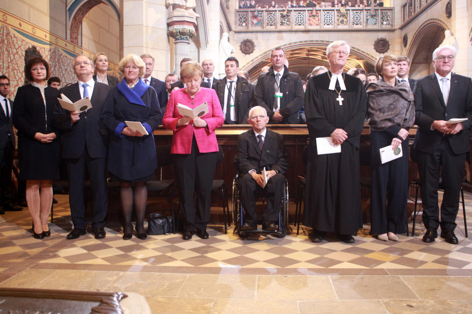 German President Frank-Walter Steinmeier, his wife Elke Buedenbender, the Chair of the Council of the Evangelical Church in Germany Heinrich Bedford-Strohm, the President of the Bundestag (lower house of parliament) Wolfgang Schaeuble, German Chancellor Angela Merkel, the Federal Government's Commissioner for Culture and the Media Monika Gruetters and Saxony-Anhalt's State Premier Reiner Haseloff attend a religious service to commemorate the 500th anniversary of the Reformation at Schlosskirche church on Reformation Day on October 31, 2017 in Wittenberg, Germany.&nbsp; (Photo: Pool via Getty Images)