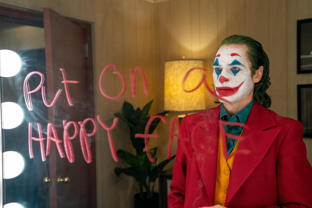 Arthur Fleck (Joaquin Phoenix) goes down a dark, face-painted path in Todd Phillips' psychological drama "Joker."