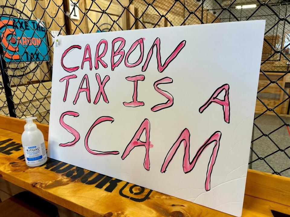 A sign at the event by the federal Tory association for Windsor West at Bad Axe Throwing on Dougall Avenue.