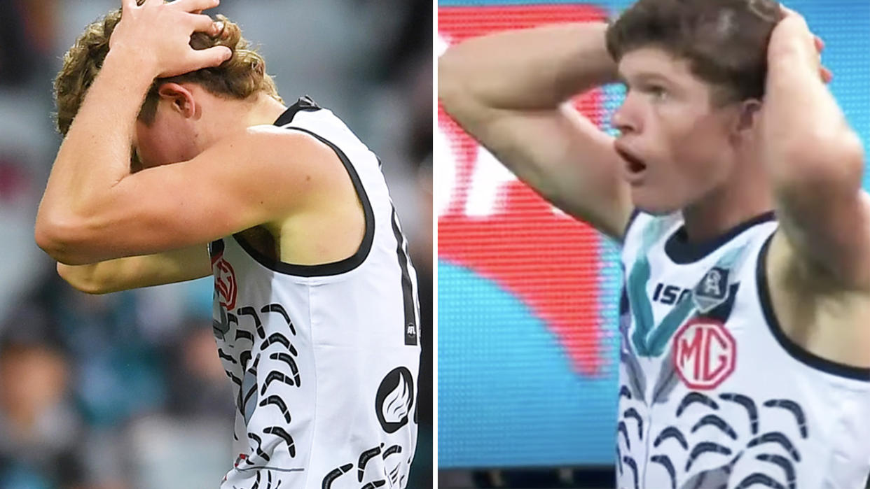 Port Adelaide rookie Mitch Georgiades puts his head in his hands after bungling a wide-open shot on goal.