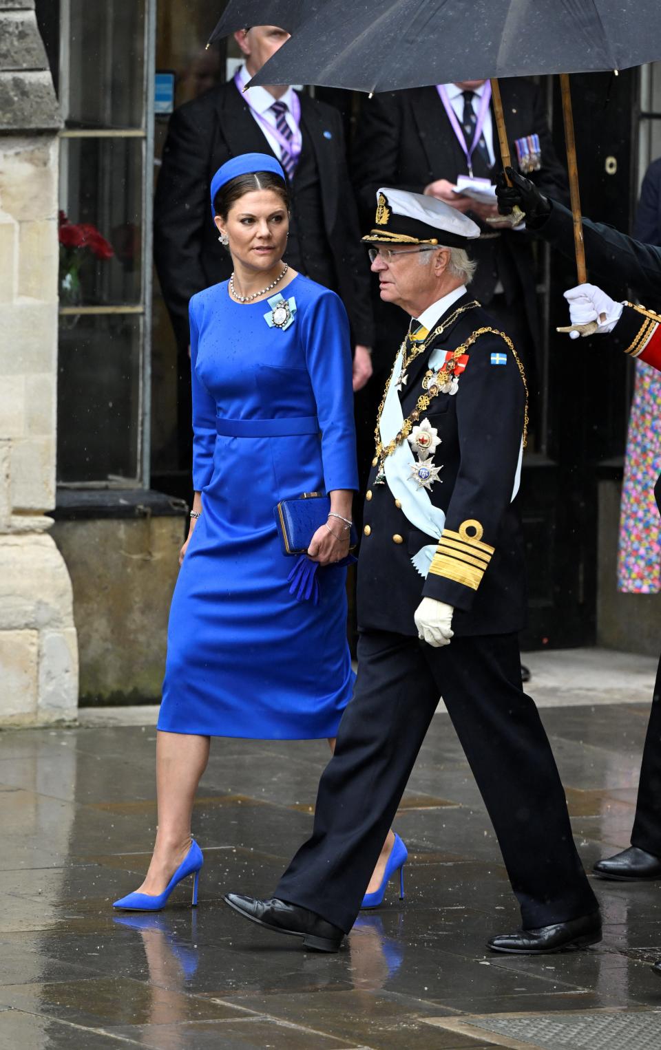 King Carl XVI Gustaf and Crown Princess Victoria arrive to attend the Coronation of King Charles III and Queen Camilla on May 6, 2023 in London, England.