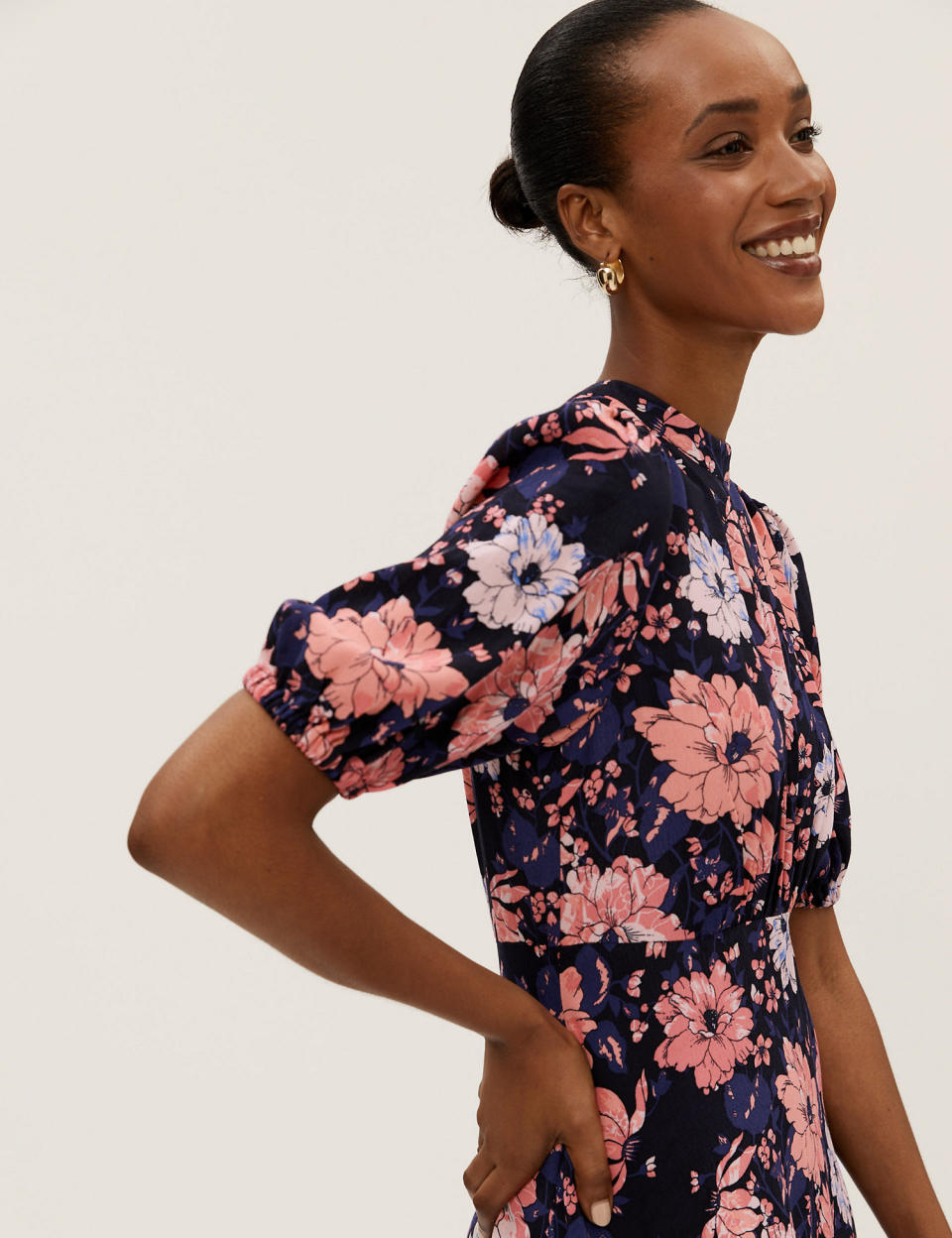The tea-dress is tapered under the bust for a flattering silhouette. (M&amp;S)
