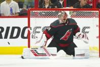 Apr 18, 2019; Raleigh, NC, USA; Carolina Hurricanes goaltender Petr Mrazek (34) makes a third period save against the Washington Capitals in game four of the first round of the 2019 Stanley Cup Playoffs at PNC Arena. The Carolina Hurricanes defeated the Washington Capitals 2-1. Mandatory Credit: James Guillory-USA TODAY Sports