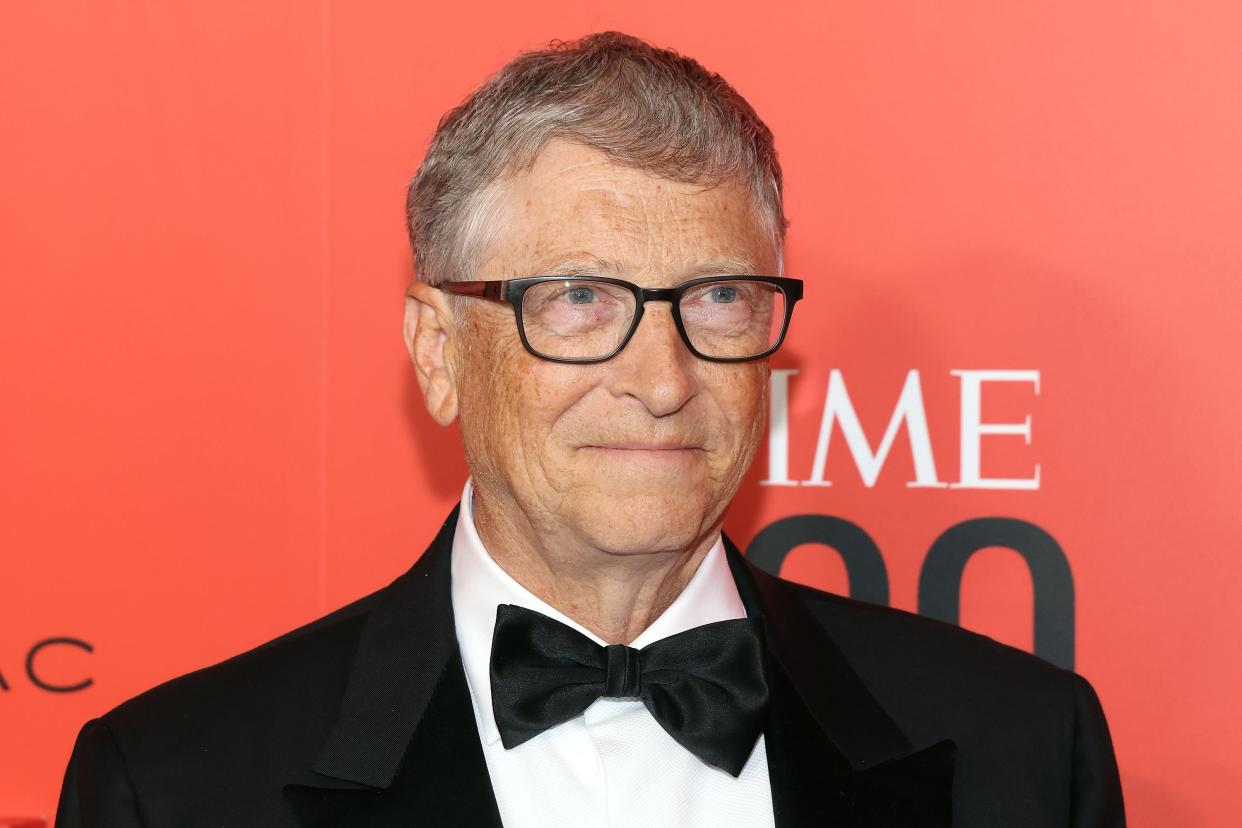 Photograph of Bill Gates wearing a bow-tie and suit whilst smiling