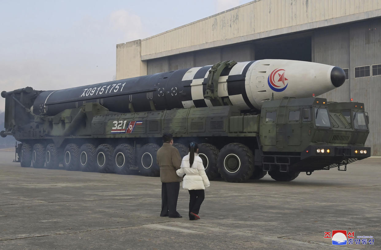 This photo provided on Nov. 19, 2022, by the North Korean government shows North Korean leader Kim Jong Un, left, and his daughter inspect what it says a Hwasong-17 intercontinental ballistic missile at Pyongyang International Airport in Pyongyang, North Korea, Friday, Nov. 18, 2022. Independent journalists were not given access to cover the event depicted in this image distributed by the North Korean government. The content of this image is as provided and cannot be independently verified. Korean language watermark on image as provided by source reads: "KCNA" which is the abbreviation for Korean Central News Agency. (Korean Central News Agency/Korea News Service via AP)