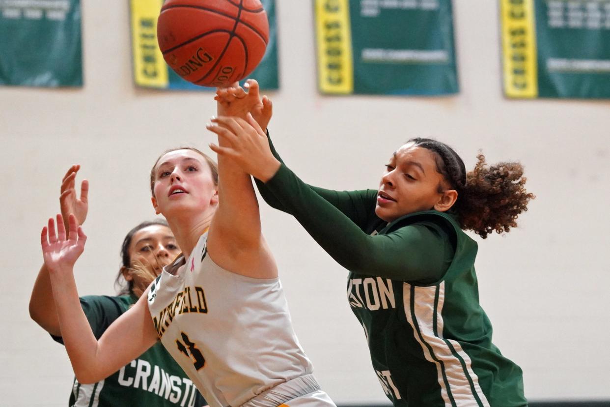 Mya Jiminez, Cranston East, right, scored 24 points in the Thunderbolts win Tuesday night.