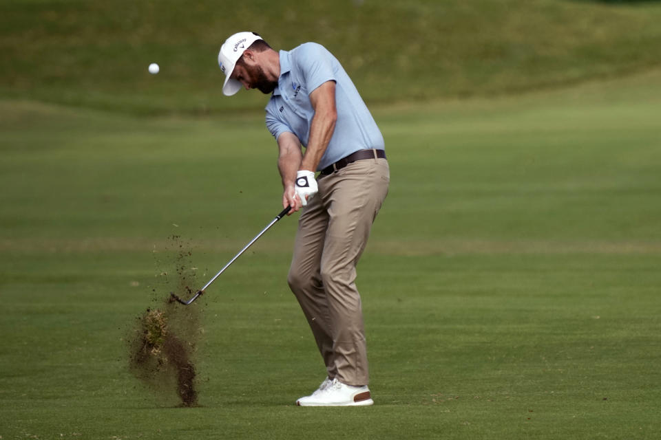 Chris Kirk hits from the 18th fairway during the third round of the Sony Open golf tournament, Saturday, Jan. 14, 2023, at Waialae Country Club in Honolulu. (AP Photo/Matt York)