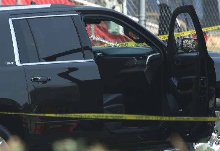 A black SUV with a hole on its windshield is seen outside the Eugene Simpson Stadium Park where House Majority Whip Steve Scales, R-La., was shot. 
