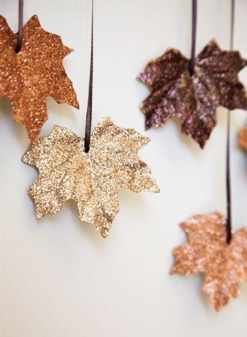 maple leaves covered with glitter