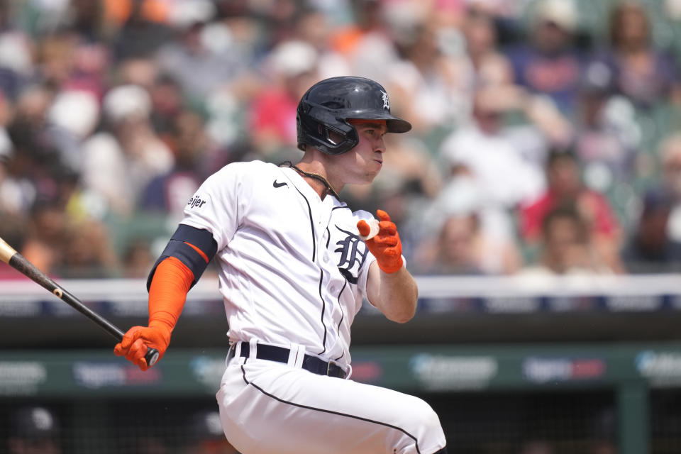 Detroit Tigers' Kerry Carpenter hits a RBI single which scores Riley Greene during the fifth inning of a baseball game against the San Francisco Giants, Monday, July 24, 2023, in Detroit. (AP Photo/Carlos Osorio)