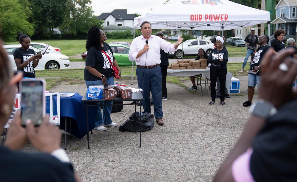 Columbus Mayor Andrew Ginther, who is running for reelection in the November general election and has also been a big supporter of Issue 1 abortion rights, speaks to a group of people Aug. 6, 2023, outside Second Baptist Church on 17th Avenue.