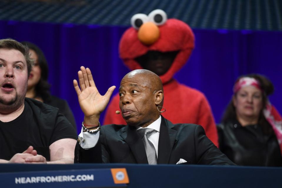 Adams participates in a sketch on stage with an Elmo street performer standing behind him at the Ziegfeld Ballroom on Saturday night. Anthony Behar/Sipa USA